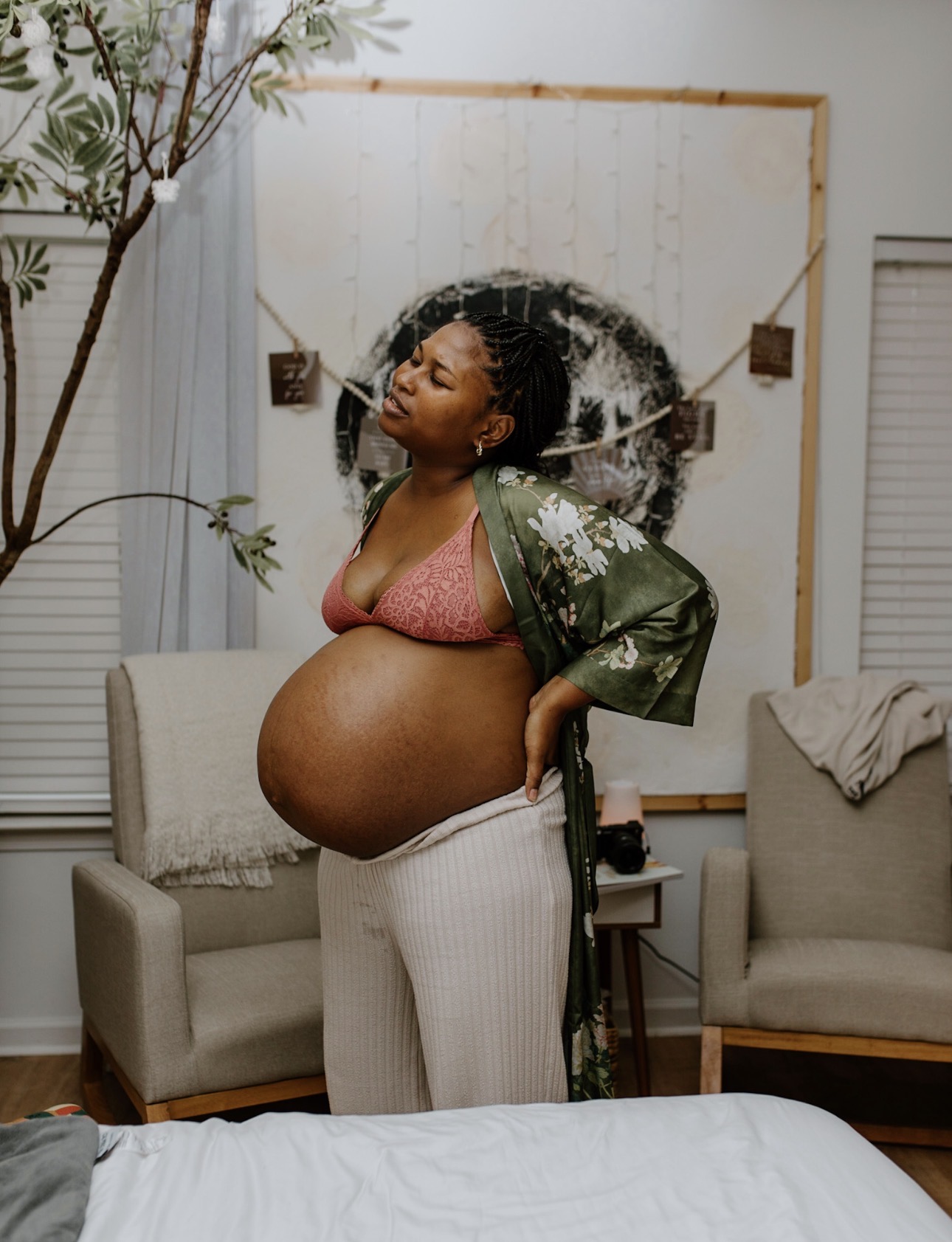 Precious standing through labor in her birth space at home